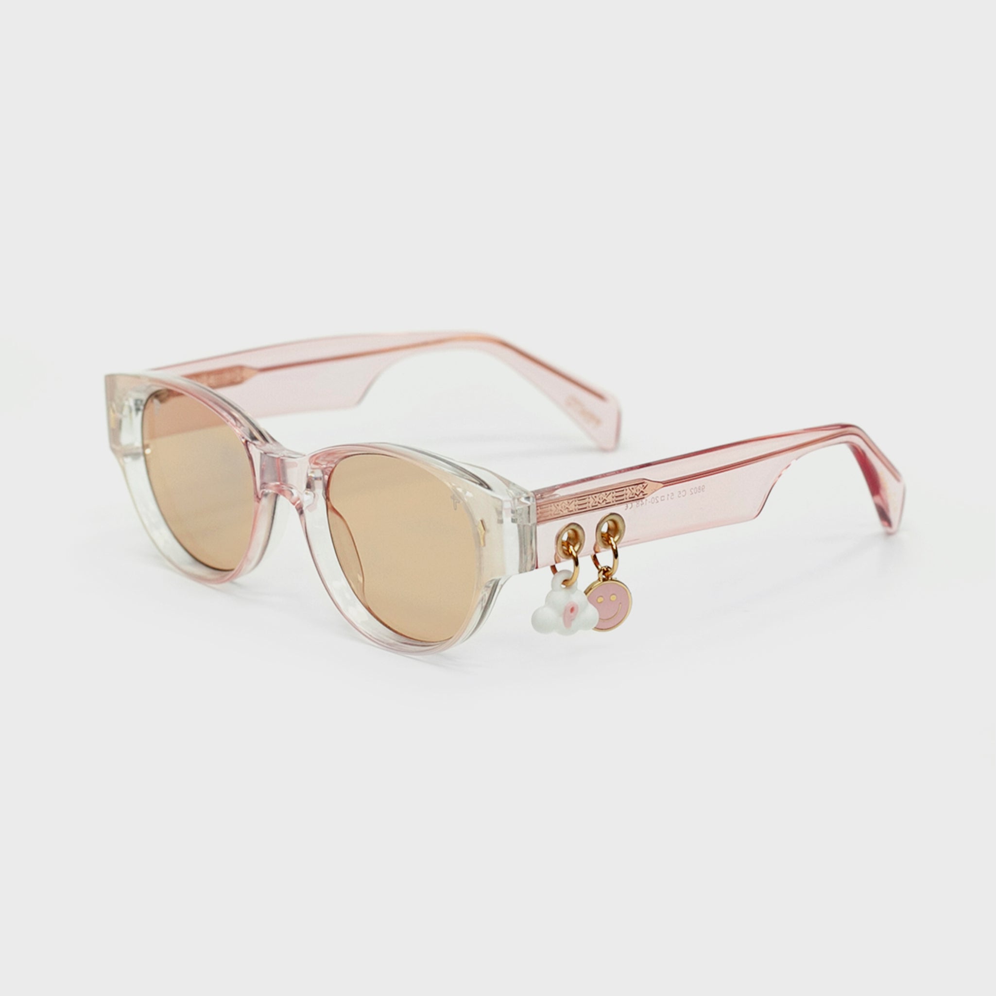 Fento Parchita sunglasses in Sky Peach – vibrant, playful design with UV protection.