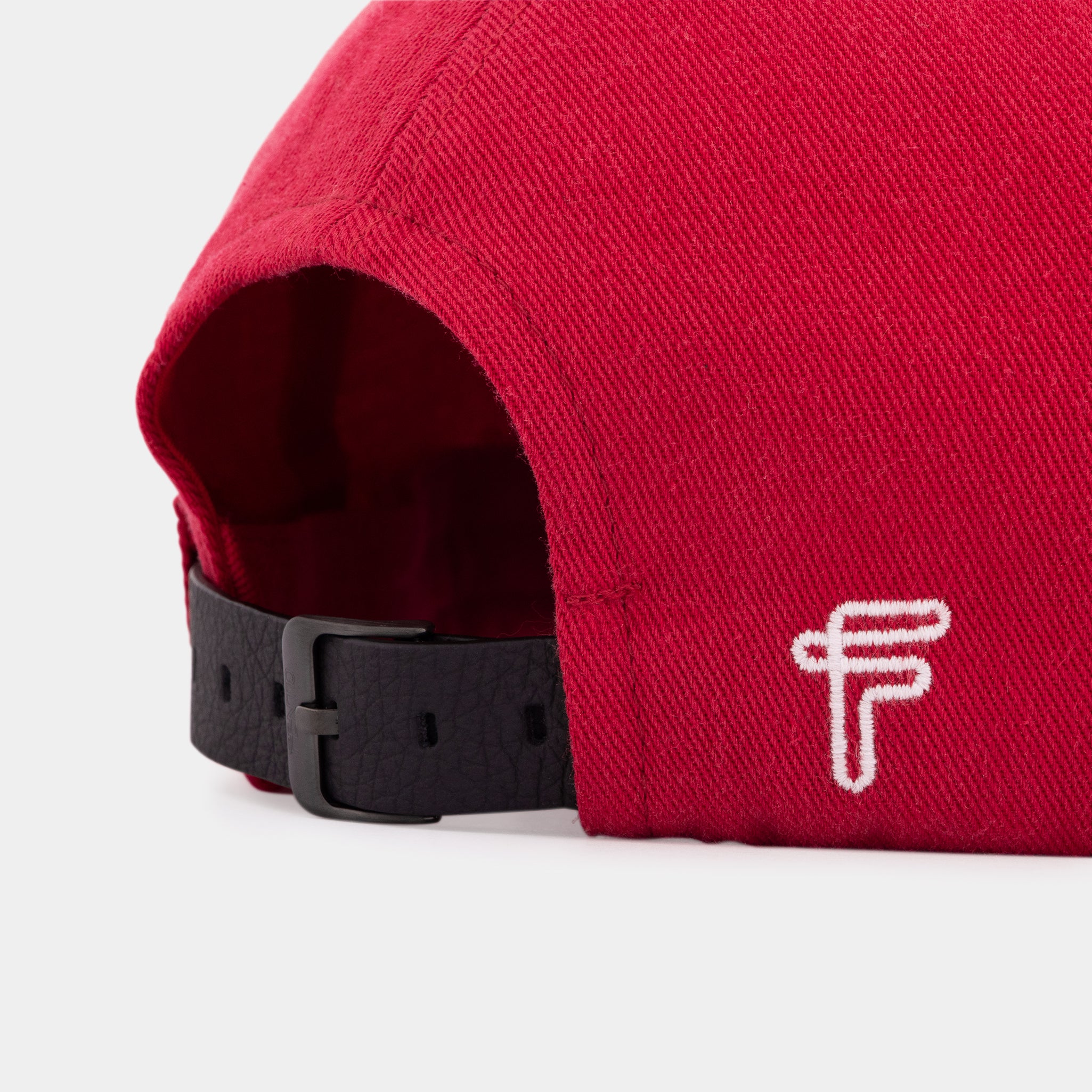 Unisex red cap Rules Breakers – curved visor and premium cotton finish.