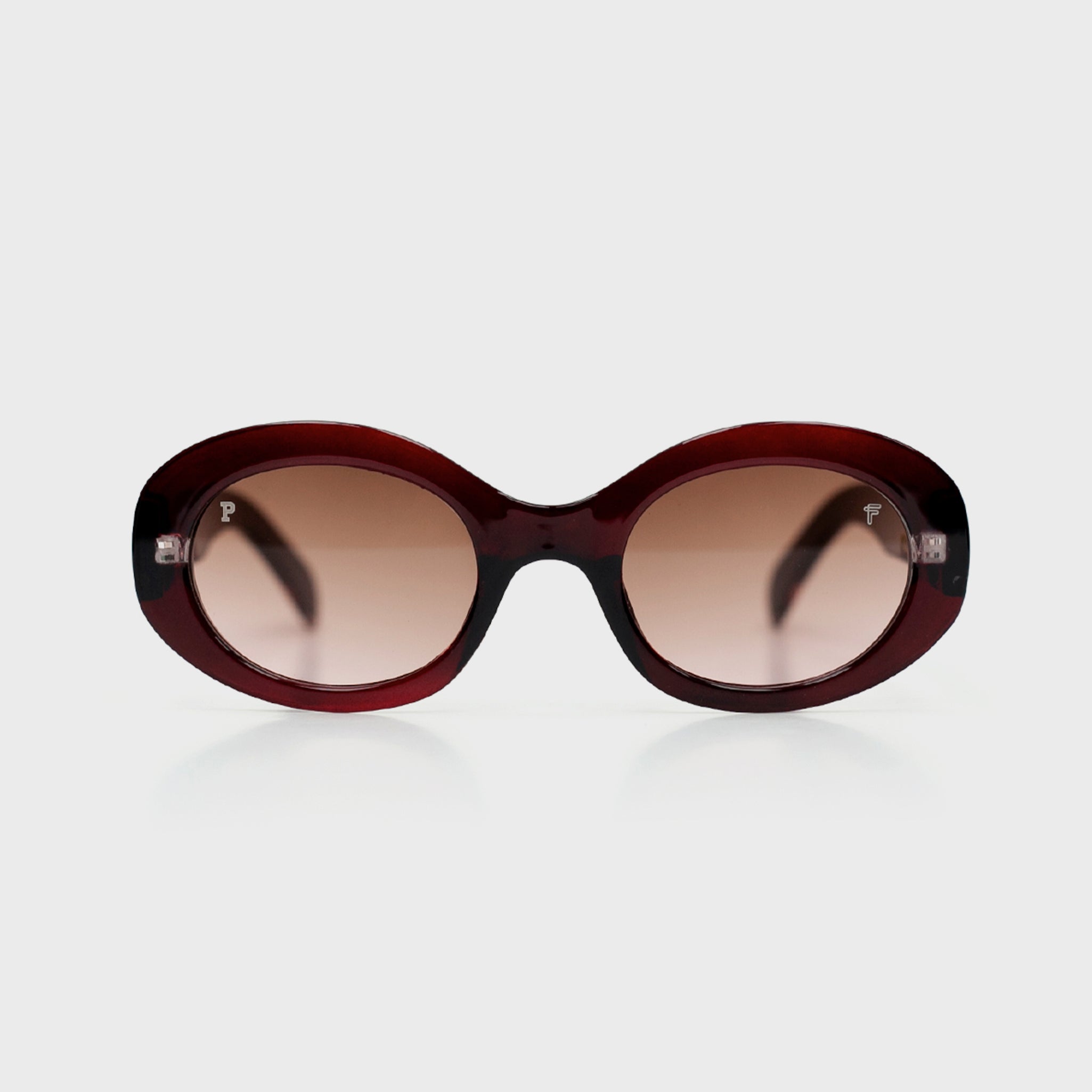 Eter Wine sunglasses by Fento – bold silhouette with a deep wine-red frame.