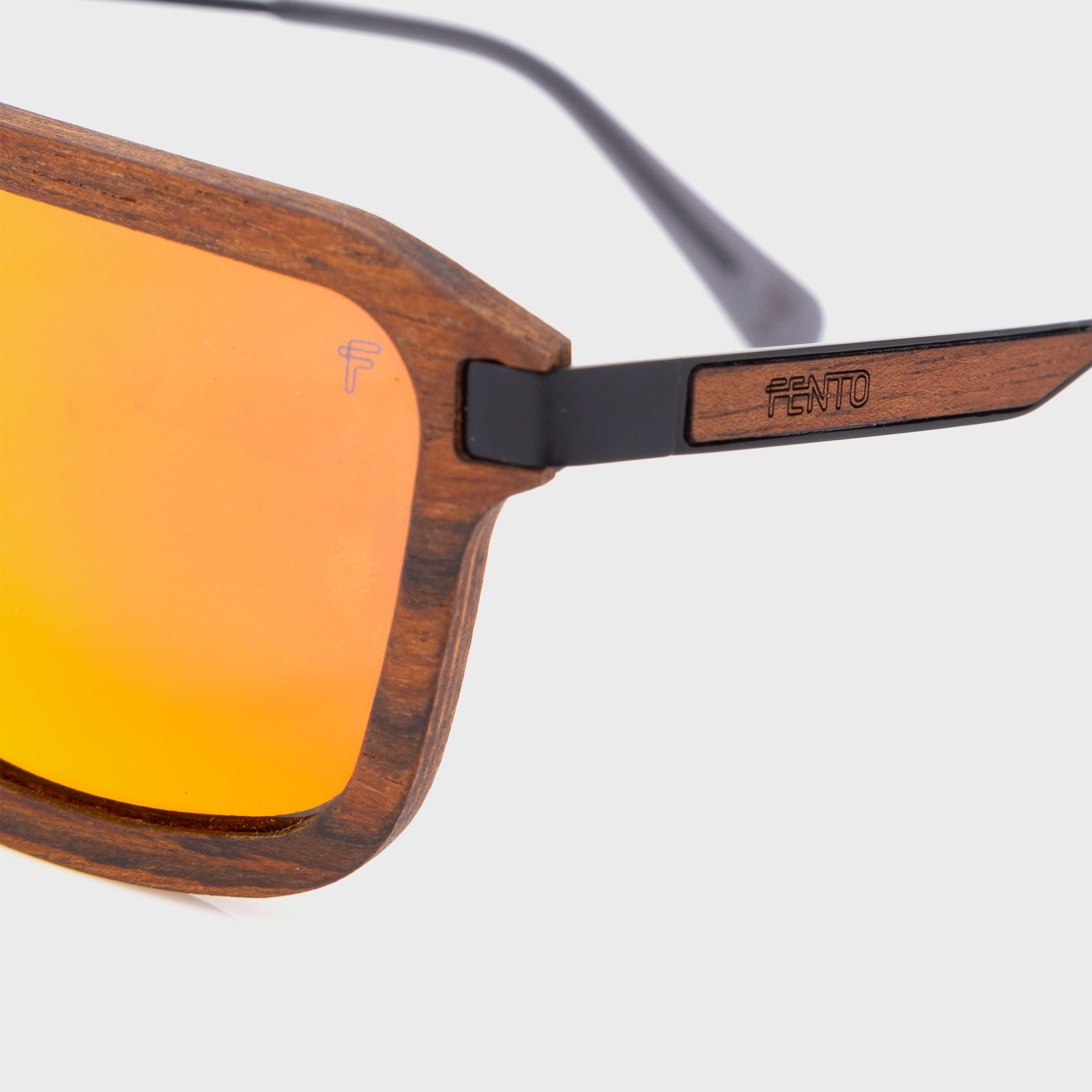Legend teak red sunglasses – lightweight wooden frame with warm, vibrant tones.