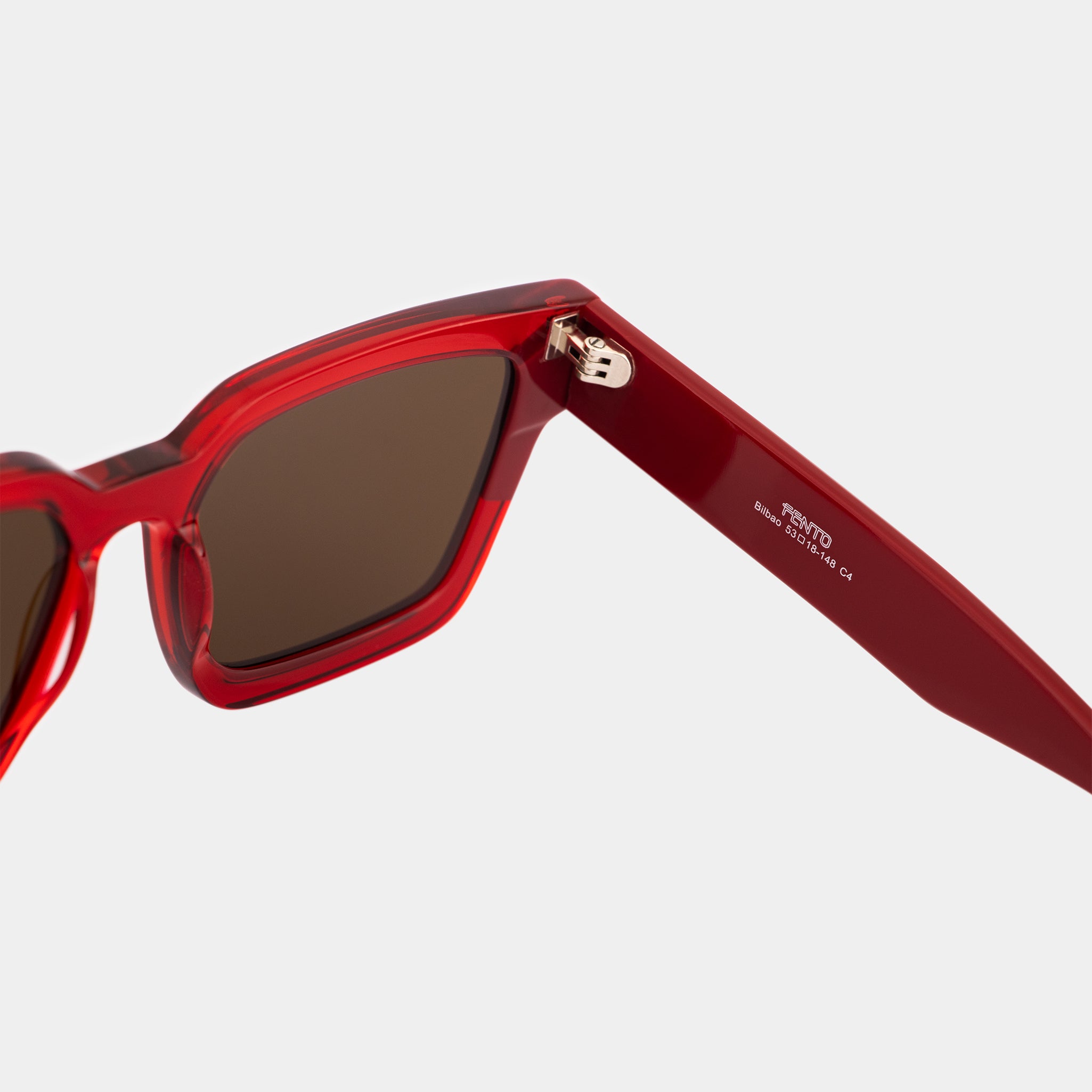 Red acetate glasses by Fento – where bold color meets modern elegance.