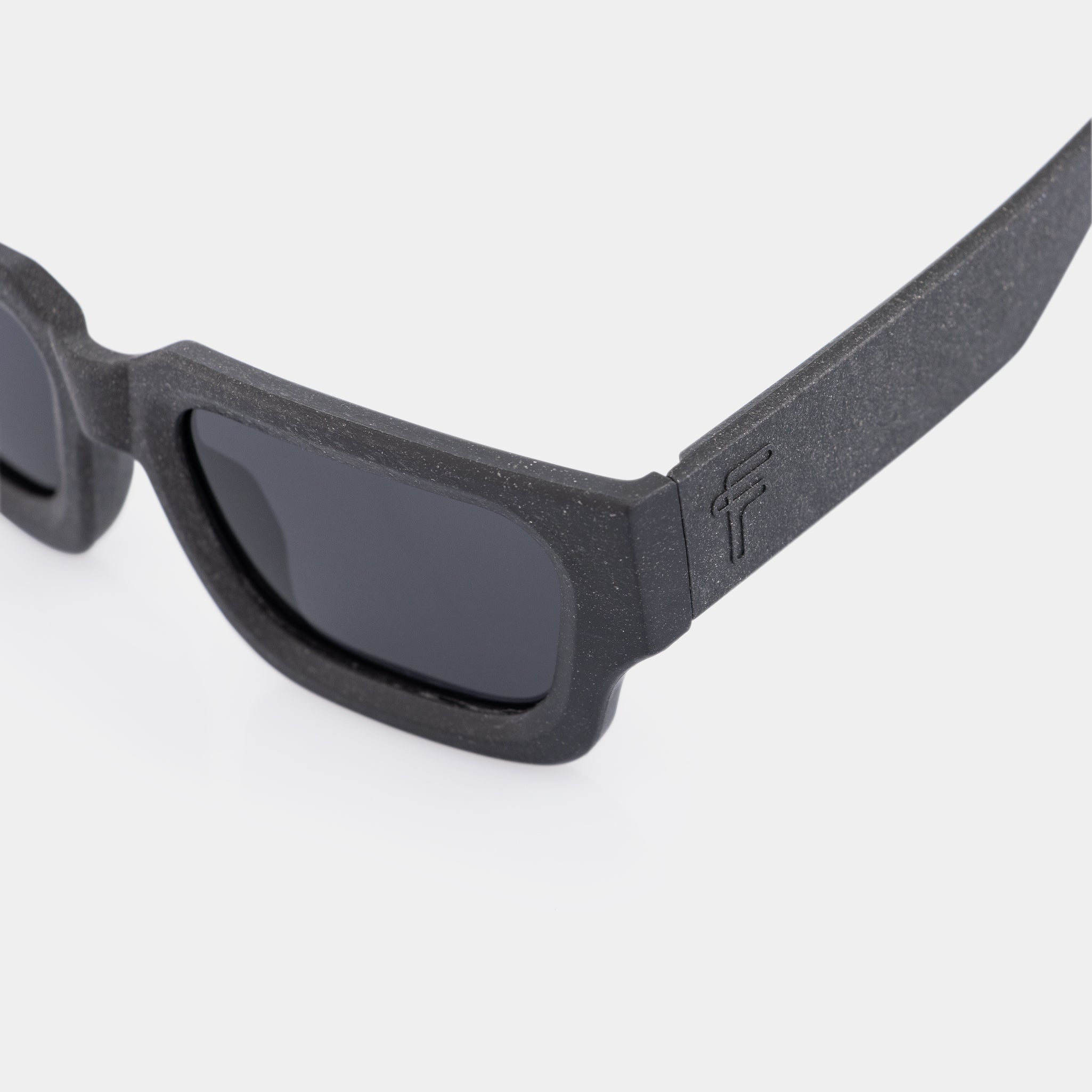 Recycled Tetra Pak sunglasses Go – cookies & cream pattern with minimalist silhouette.