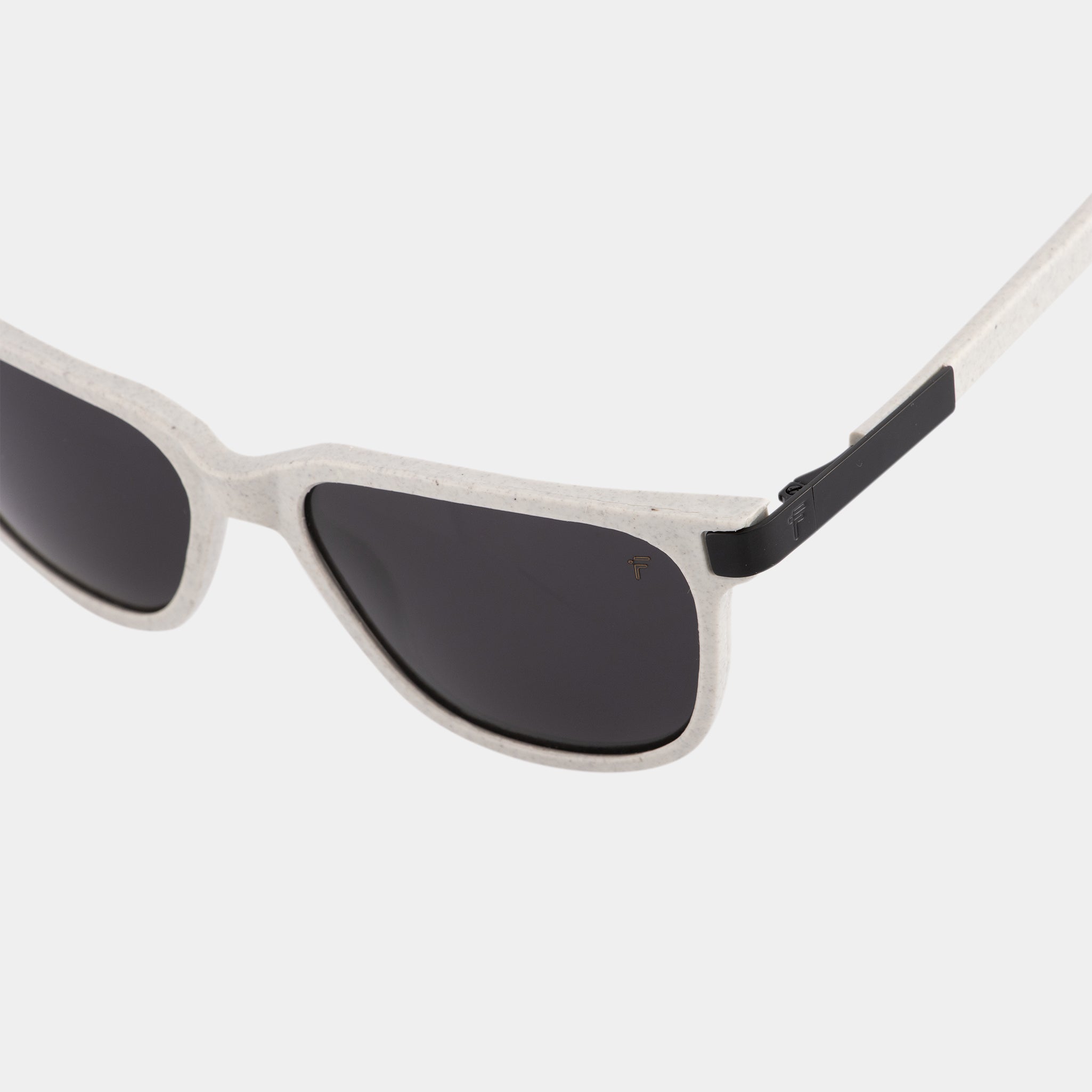 Tetra Pak white frame sunglasses – lightweight, recycled, and ready for everyday style.