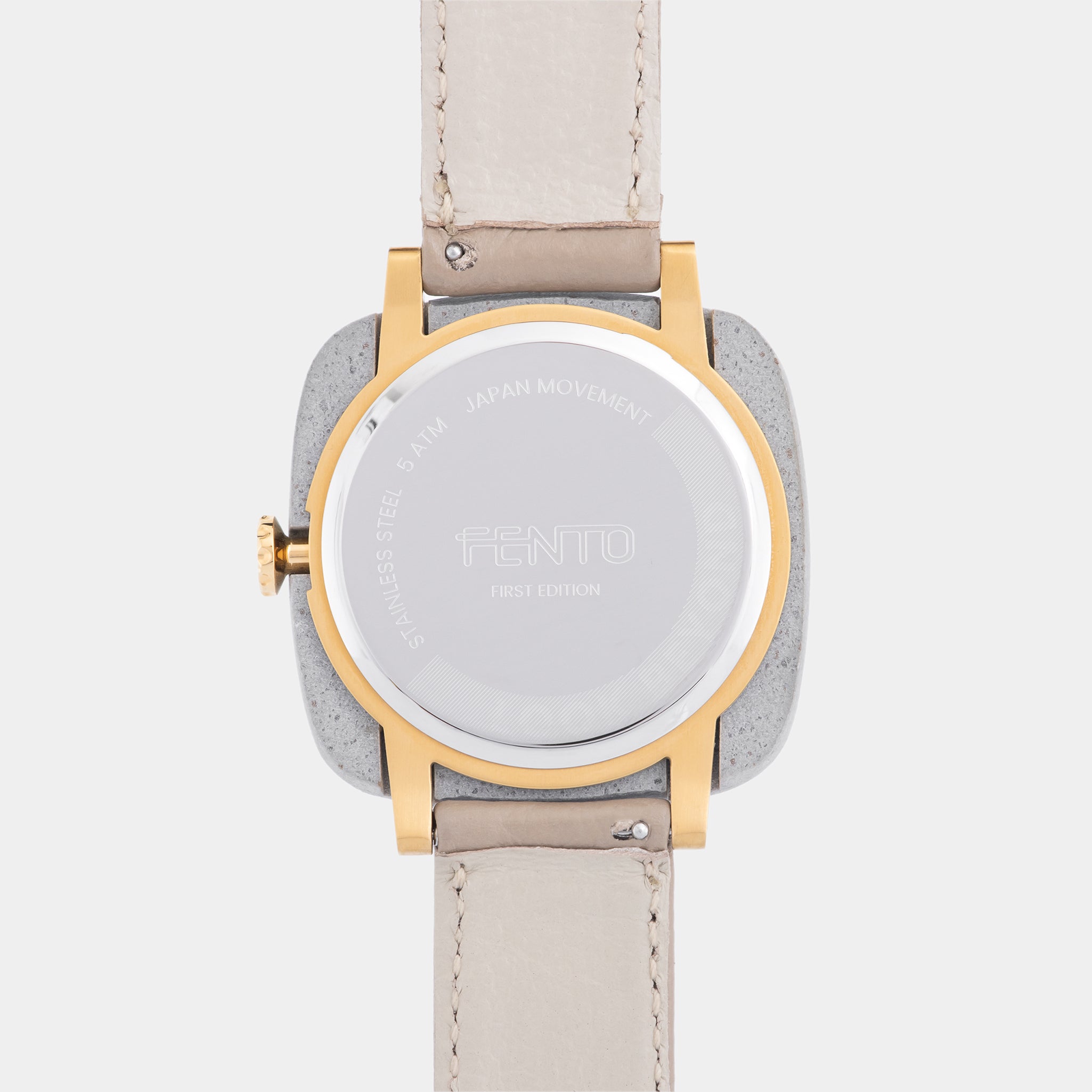 Foster concrete and leather watch – modern design with gold trim and natural textures.