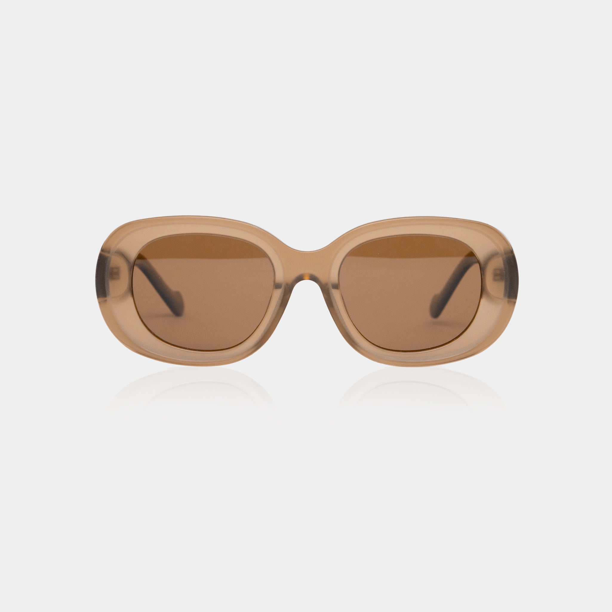 Iris Brown sunglasses – translucent brown acetate frame with a soft square shape.