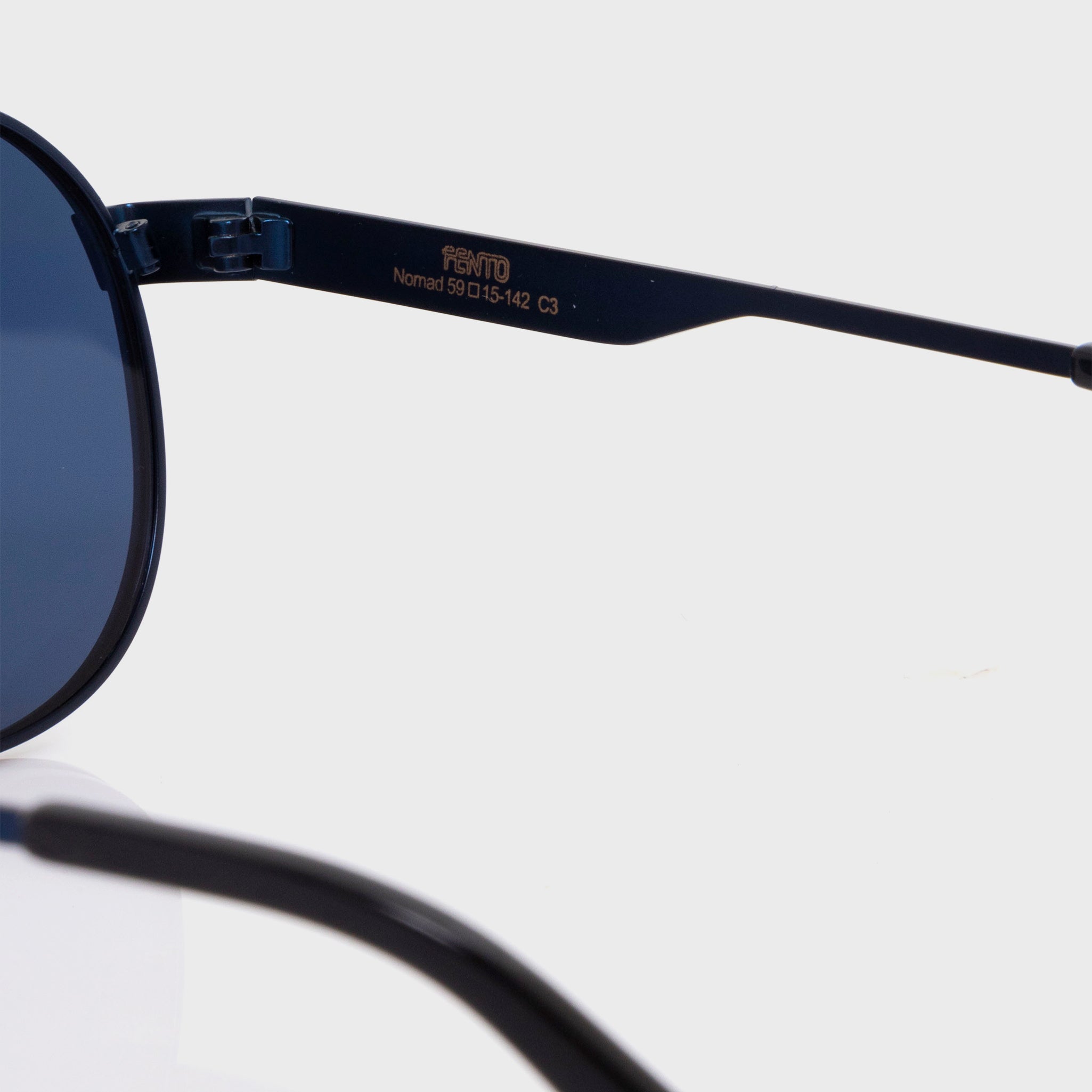 Nomad eyewear in stainless steel navy – durability meets timeless style.