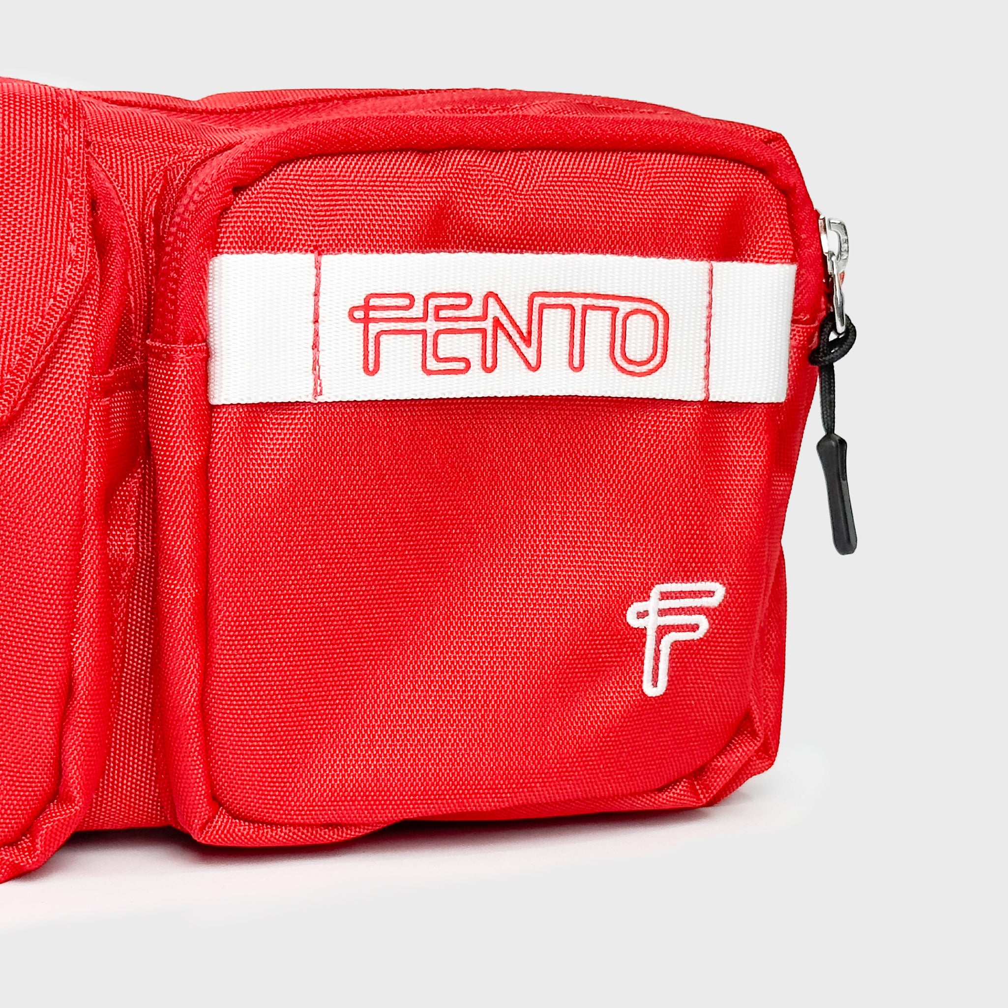 Red utility belt bag – durable canvas construction with a vibrant urban look.