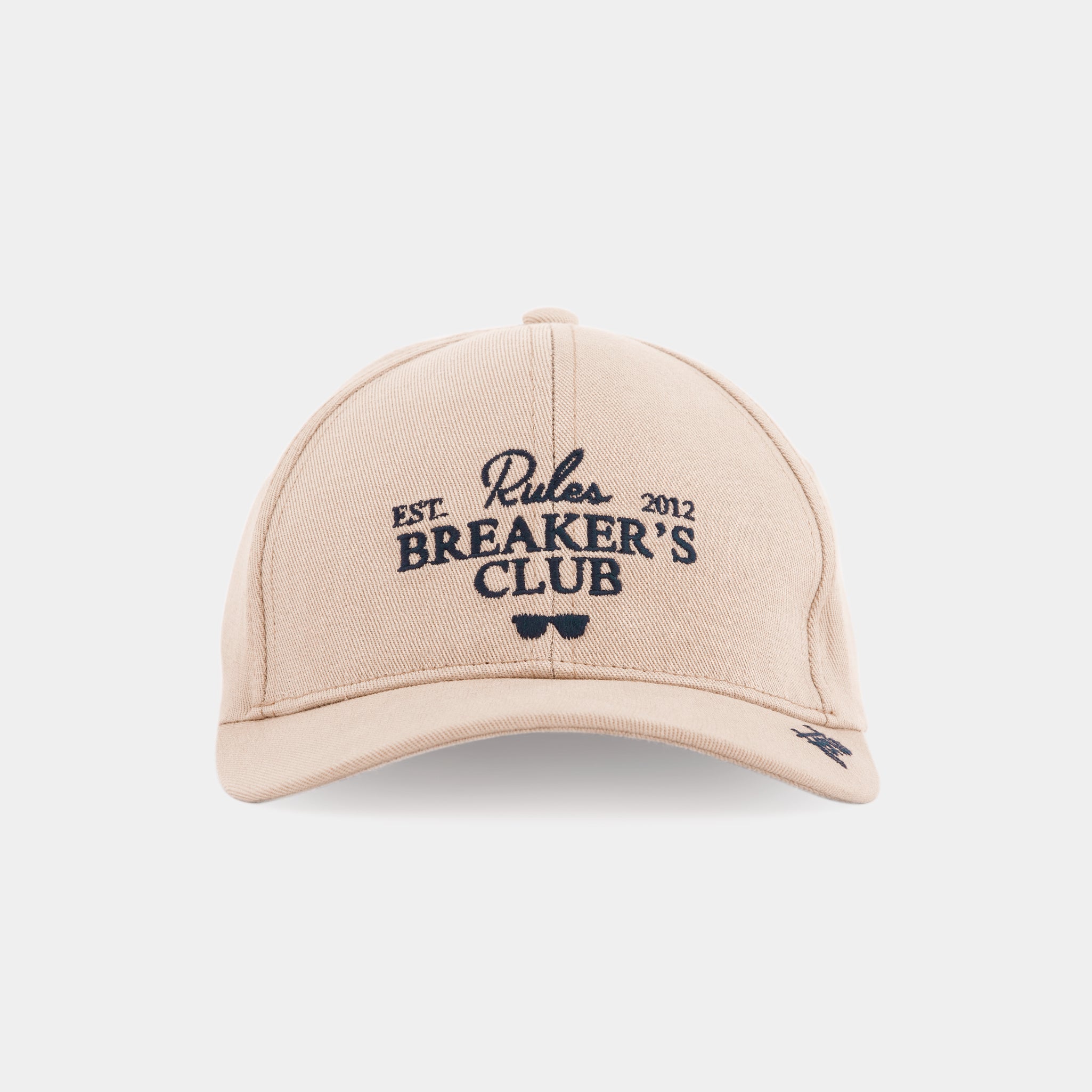 Rules Breakers beige cap – classic unisex baseball style with minimalist embroidery.