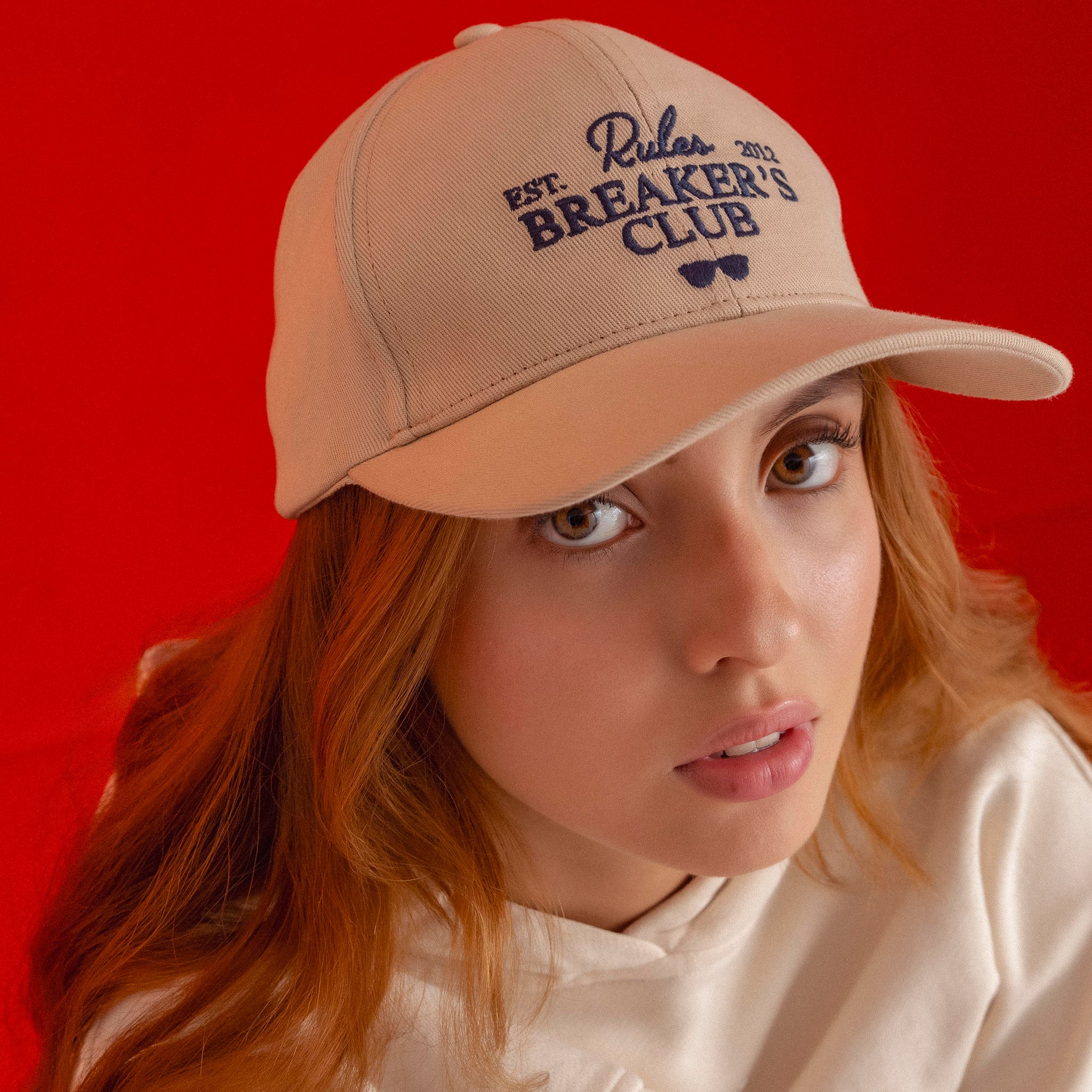 Beige baseball cap Rules Breakers – soft neutral tone with signature logo.