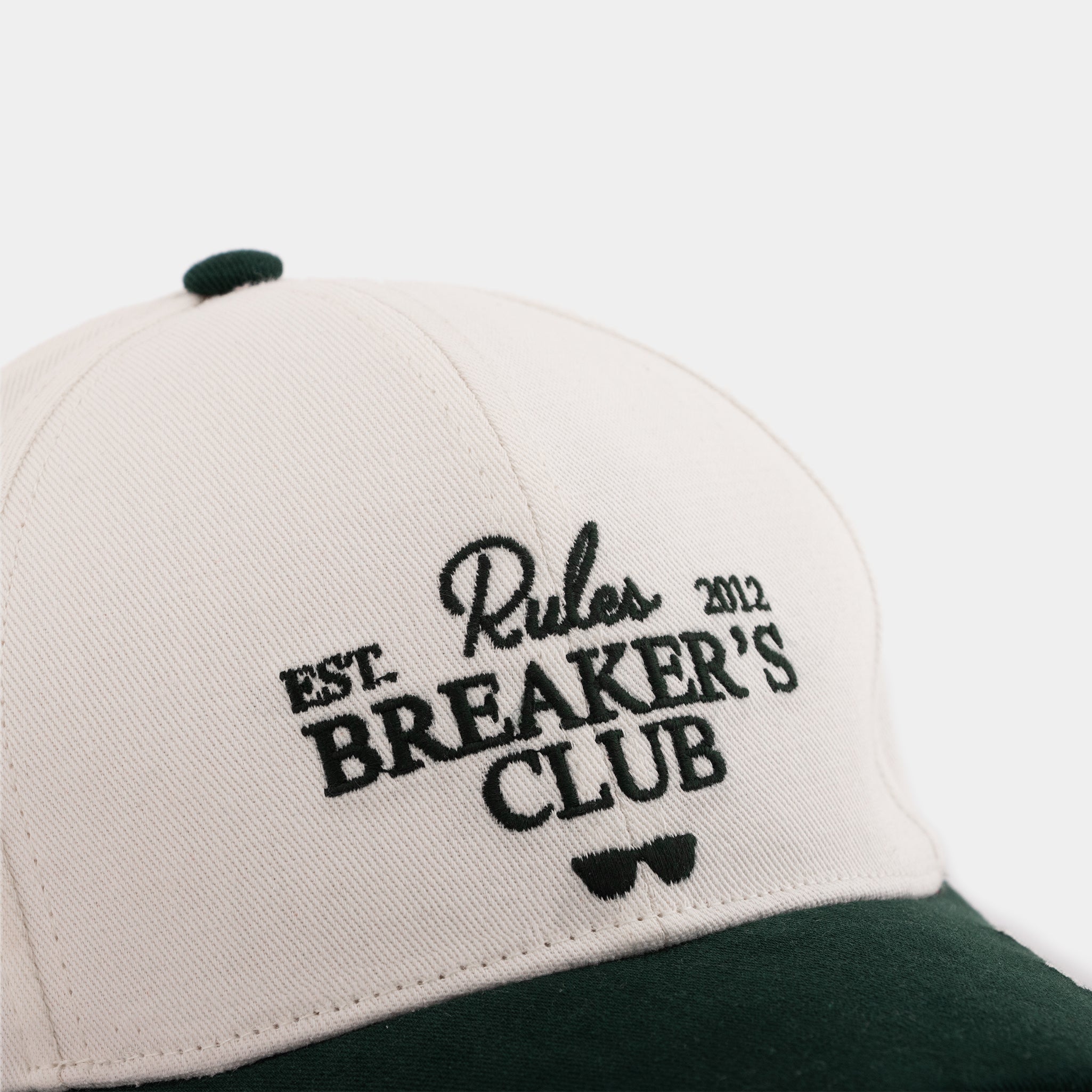 Unisex green cap Rules Breakers – premium cotton blend in a standout tone.