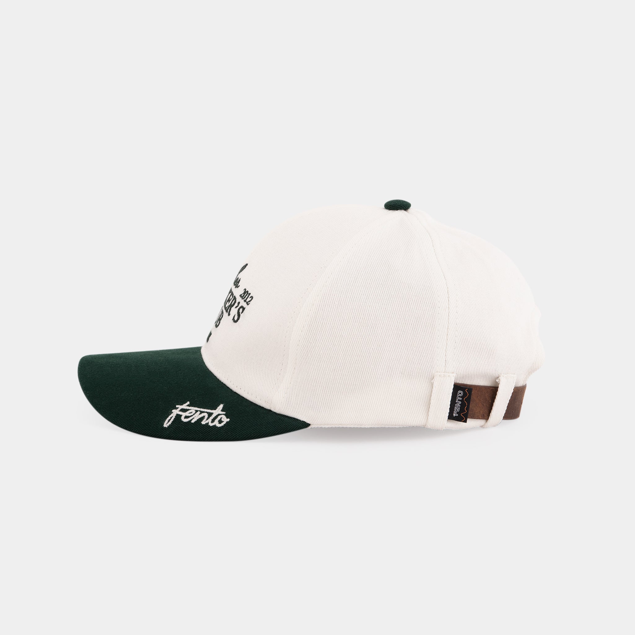 Rules Breakers cap in green – curved visor and relaxed everyday style.