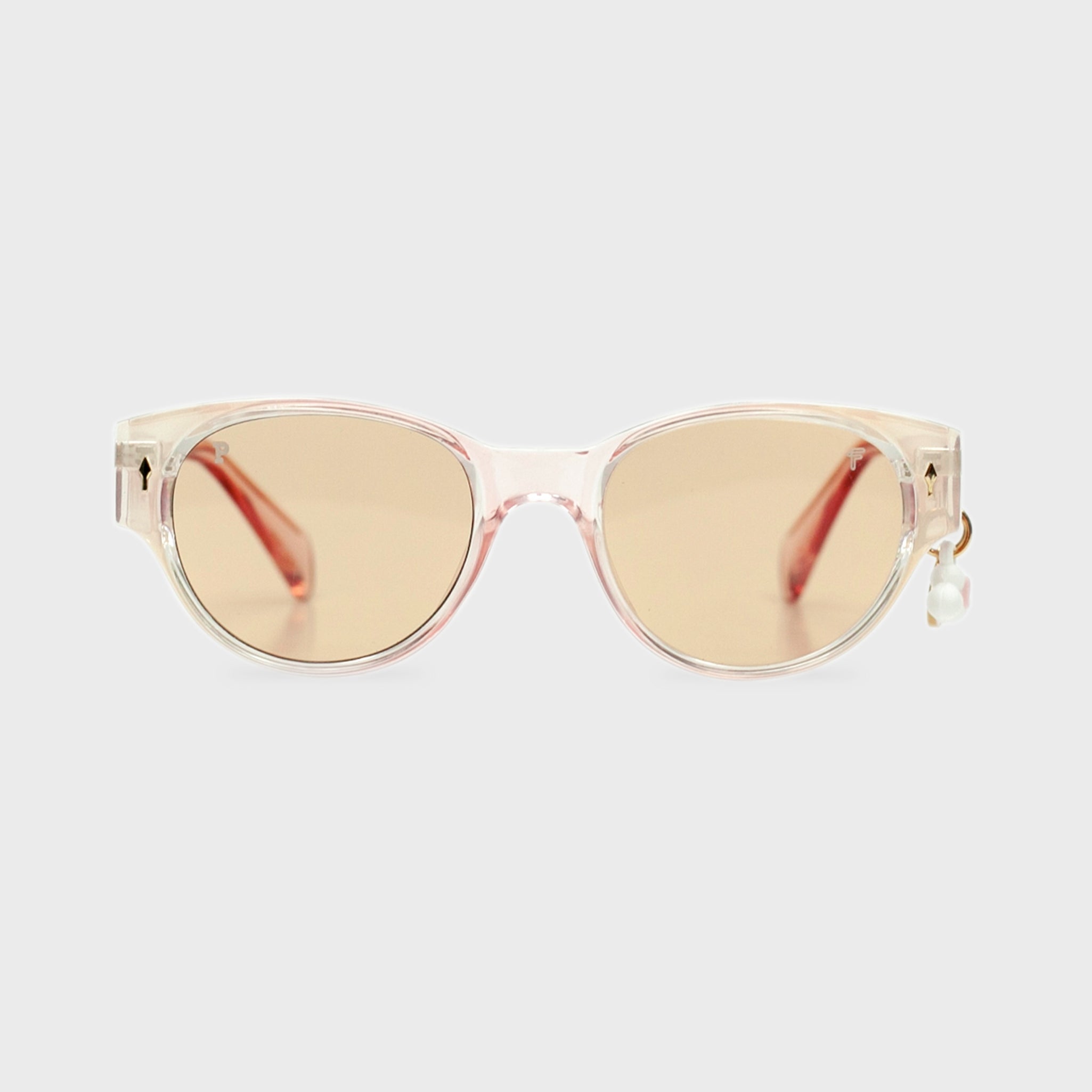 Sky Peach sunglasses by Fento – translucent peach-toned frame with bold summer style.