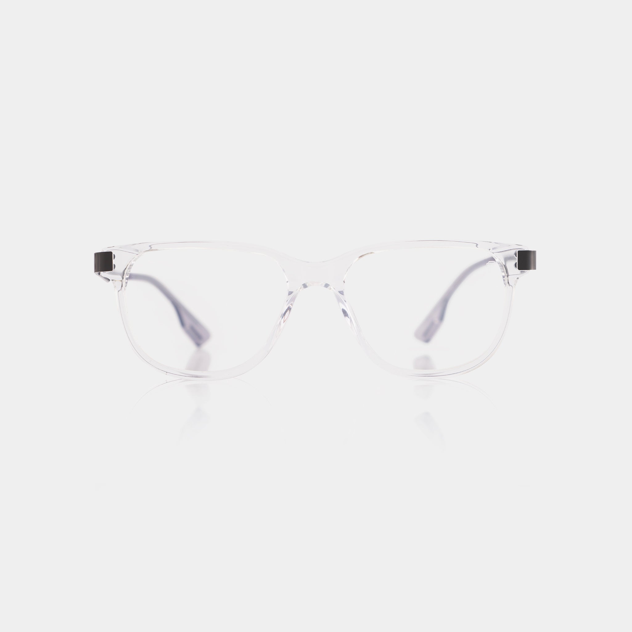 Specta Iron Eyeglasses – transparent acetate frame combined with minimalist steel.