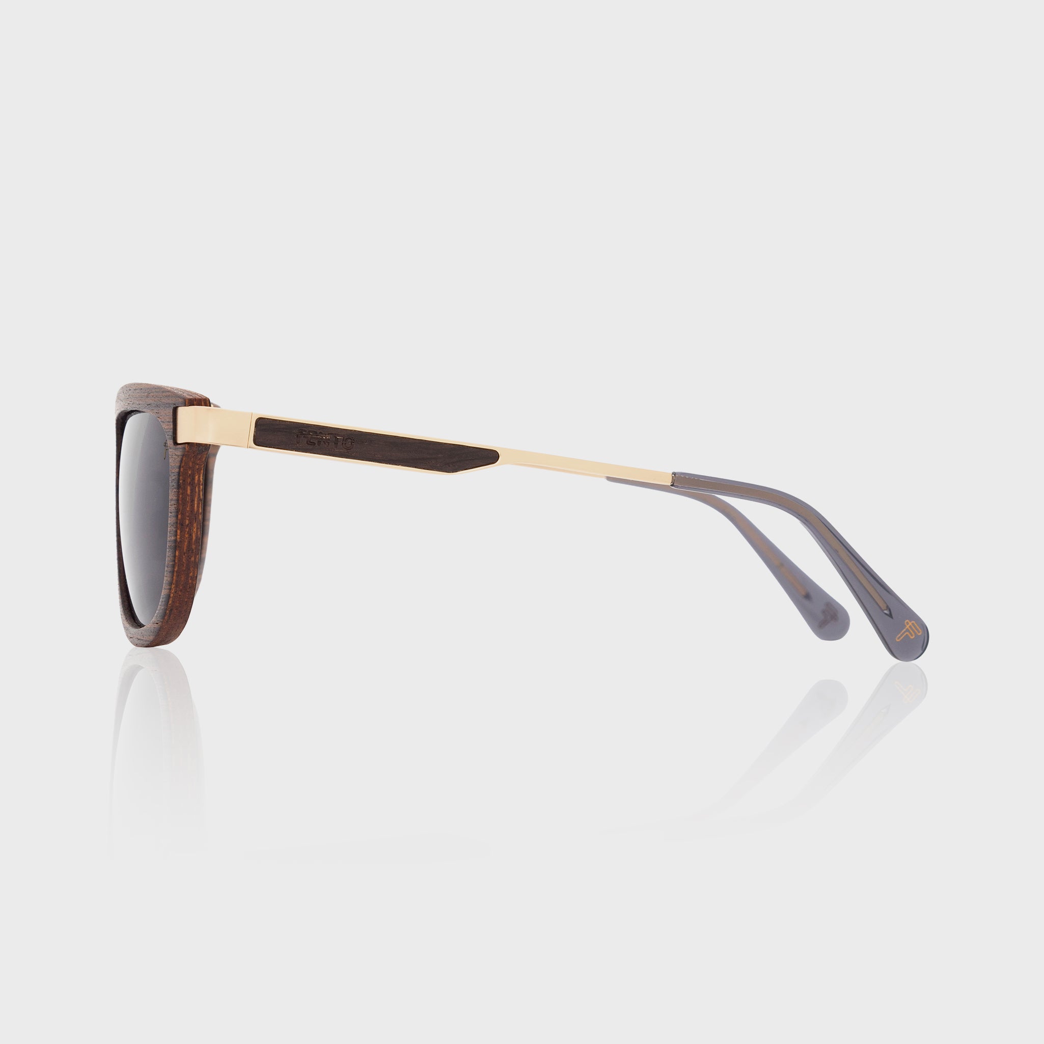 Specta wooden sunglasses – dark wengue body, golden touches, and neutral grey lenses.

